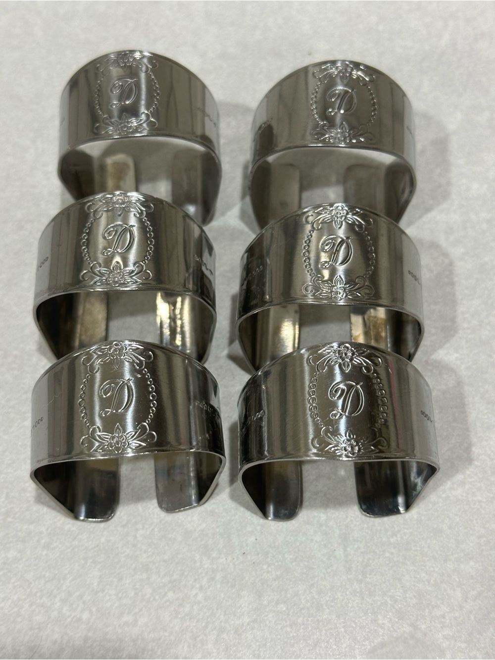 The Custom Craft Stainless Monogrammed Napkin Rings Set of 6 is a elegant and st
